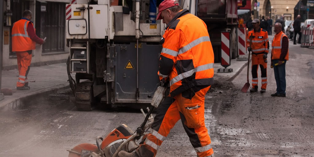 Road construction workers.   CC0 Public Domain